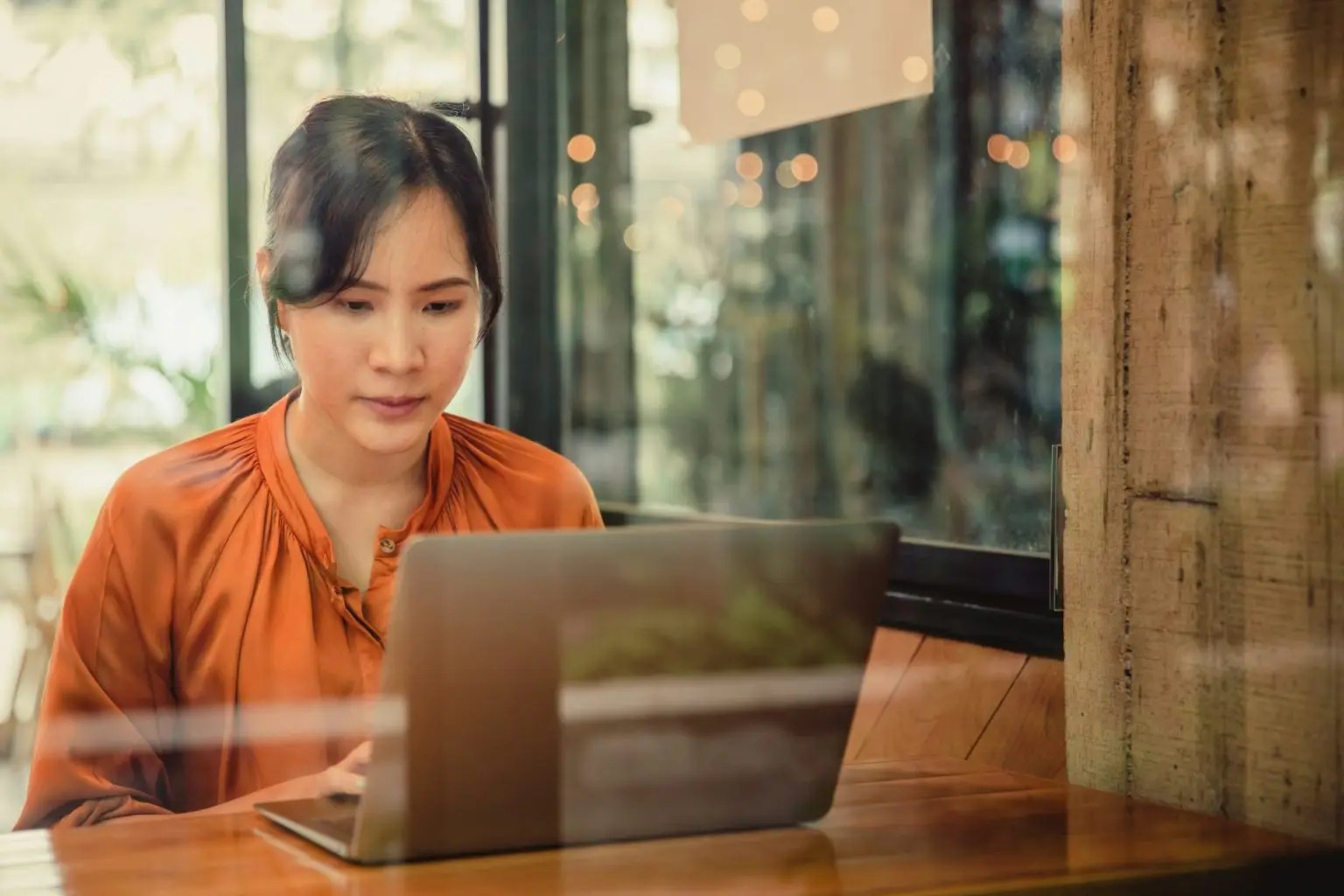Agency professional reviewing white-label marketing solutions on a laptop.